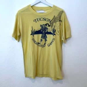Rolland Berry Create T-shirt size M in vintage pale gold yellow. Thin and soft.